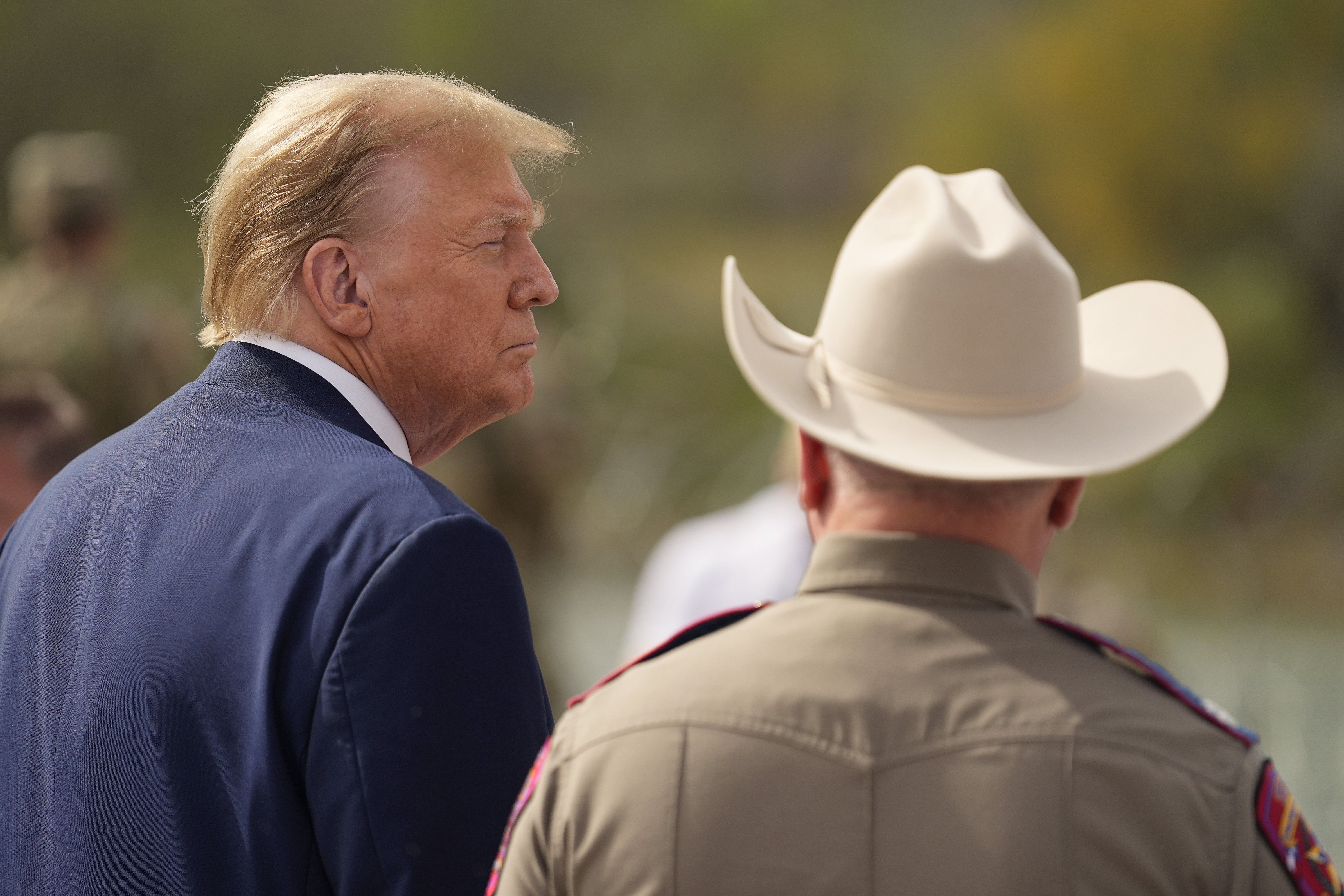 Republican presidential candidate former President Donald Trump listens as he visits the boat ramp at Shelby Park during a visit to the U.S.-Mexico border, Thursday, Feb. 29, 2024, in Eagle Pass, Texas. (AP Photo/Eric Gay)